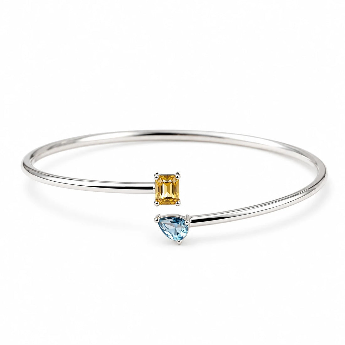 Silver-tone double birthstone bracelet worn on the wrist