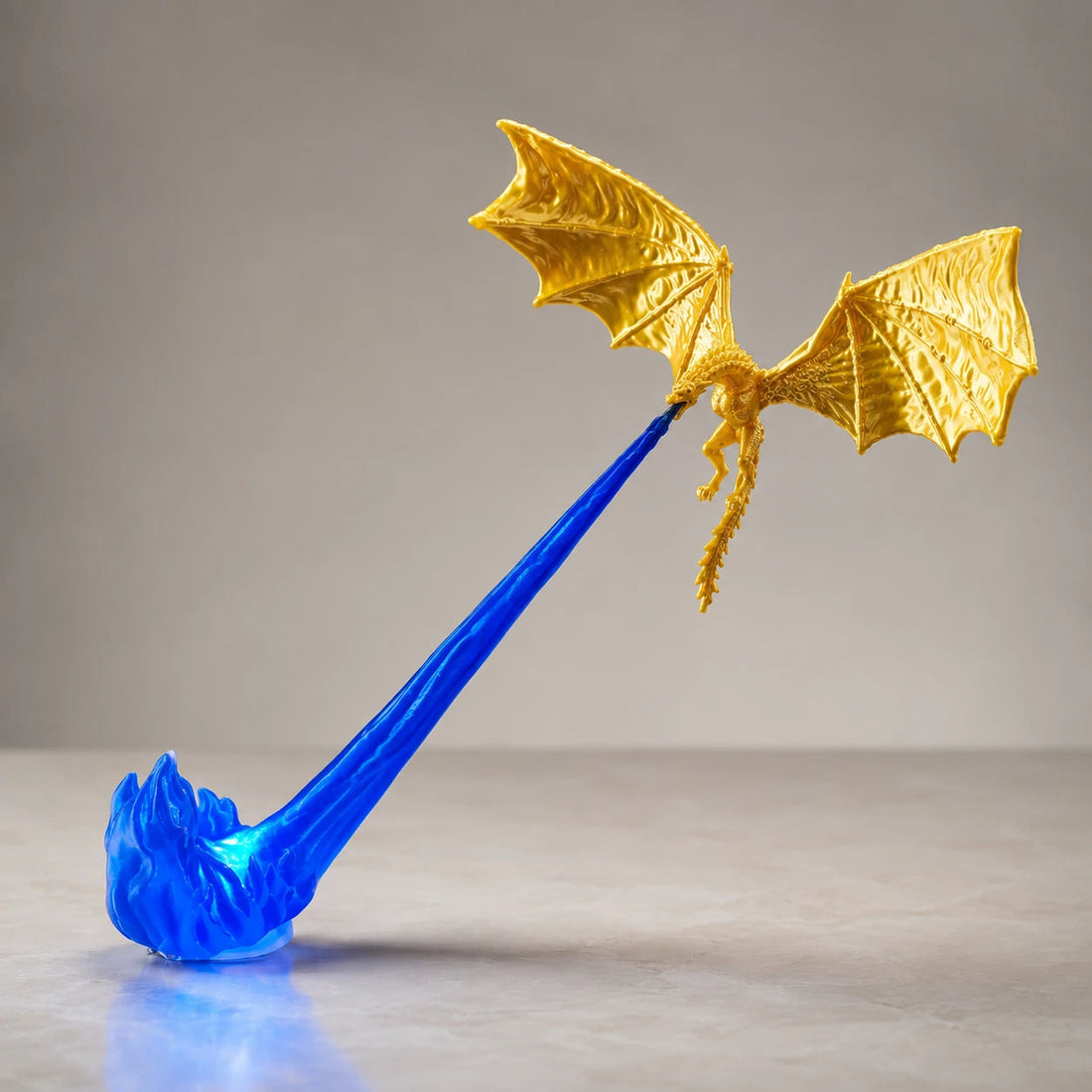 Gold dragon with a blue LED flame base
